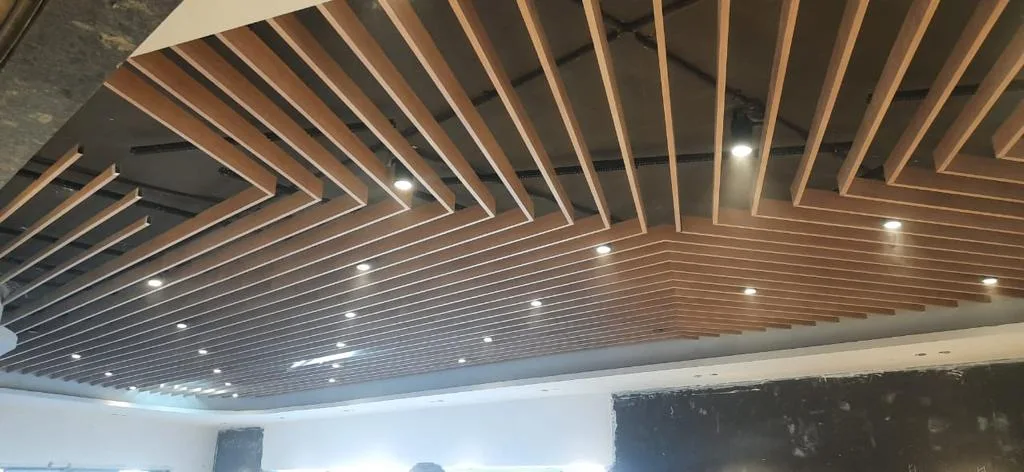 Recessed electrical lighting within a timber baffle ceiling