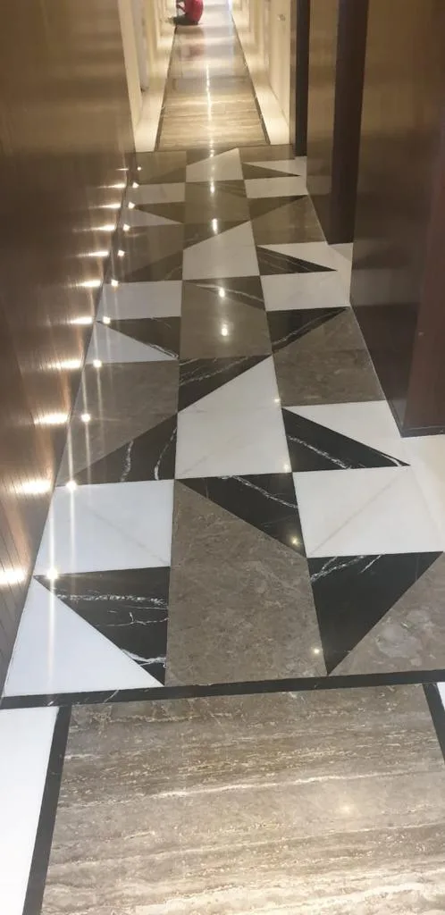 Decorative marble floor inlay and polished finishing details