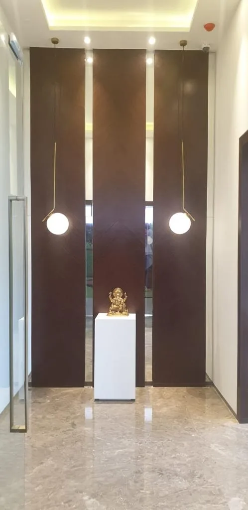 Entrance Lobbies — Lobby wall niche with pendant lights