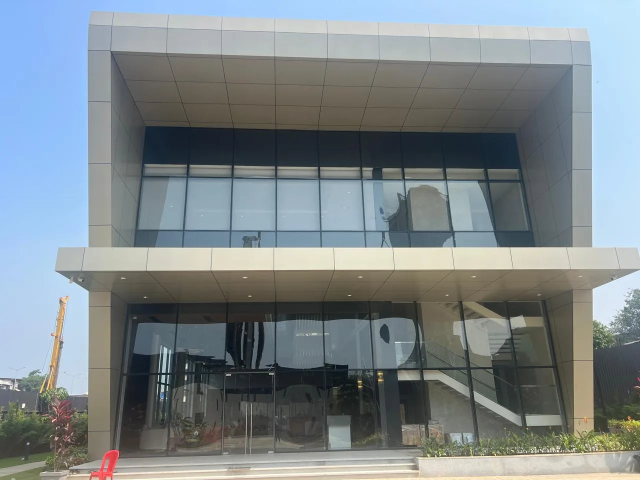 Completed commercial building with glazed frontage and exterior panels