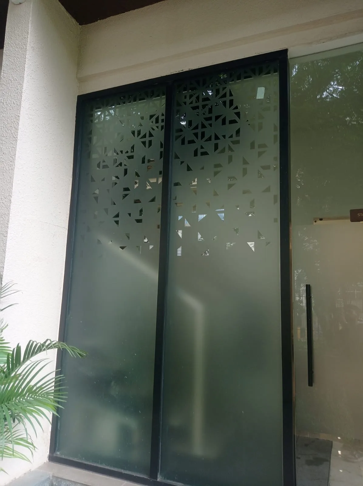FACADE Works — Frosted glass door with decorative pattern