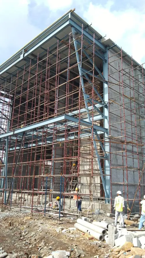 MS Fabrication — Multi-storey steel structure with scaffolding