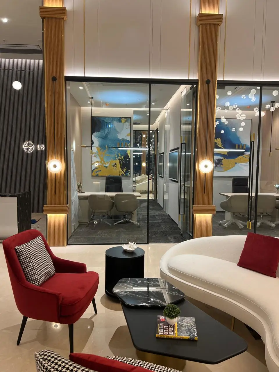 Sales Offices — Sales lounge with view into glass cabins