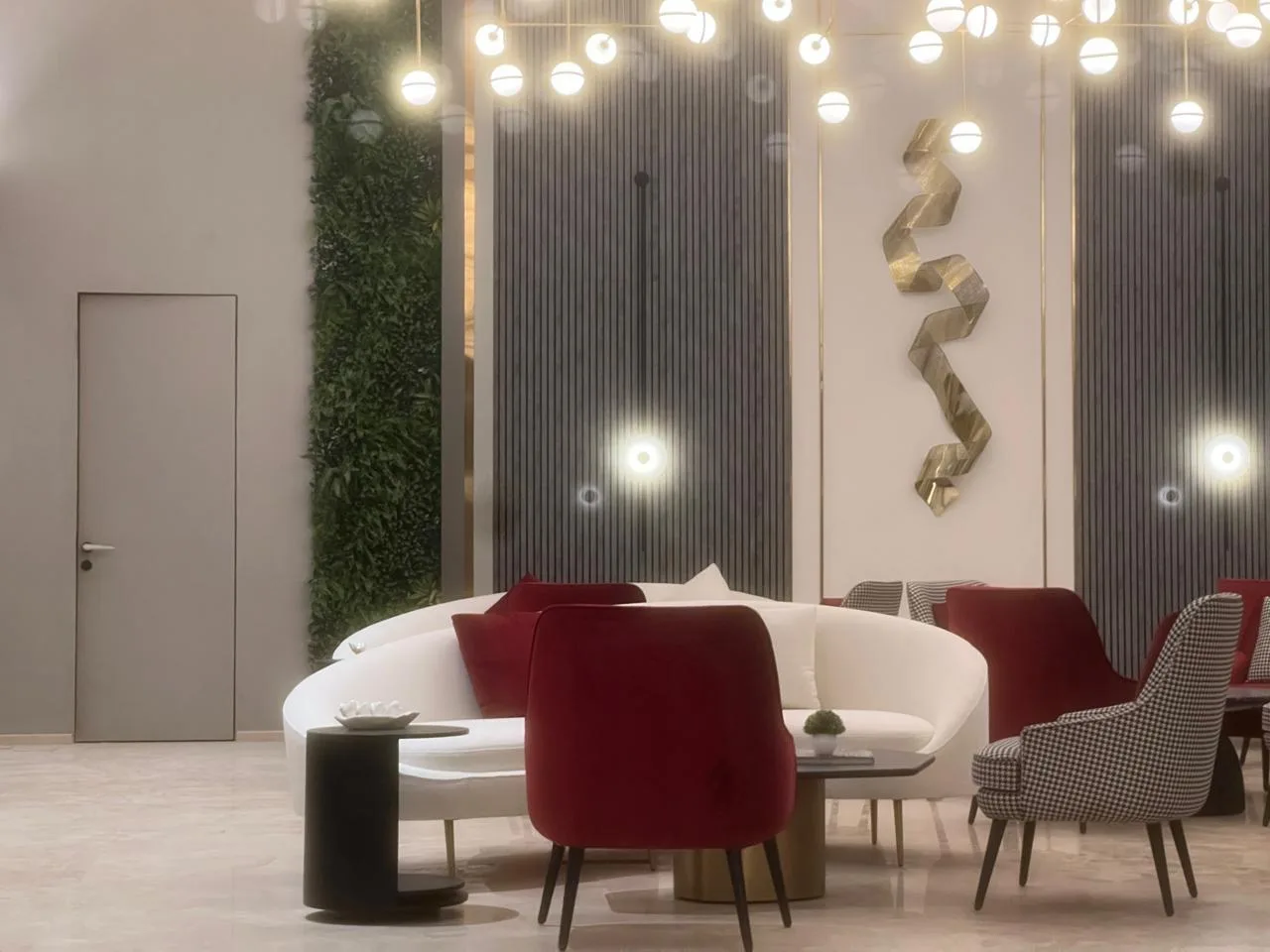 Sales Offices — Sales lounge seating with cluster pendant lights
