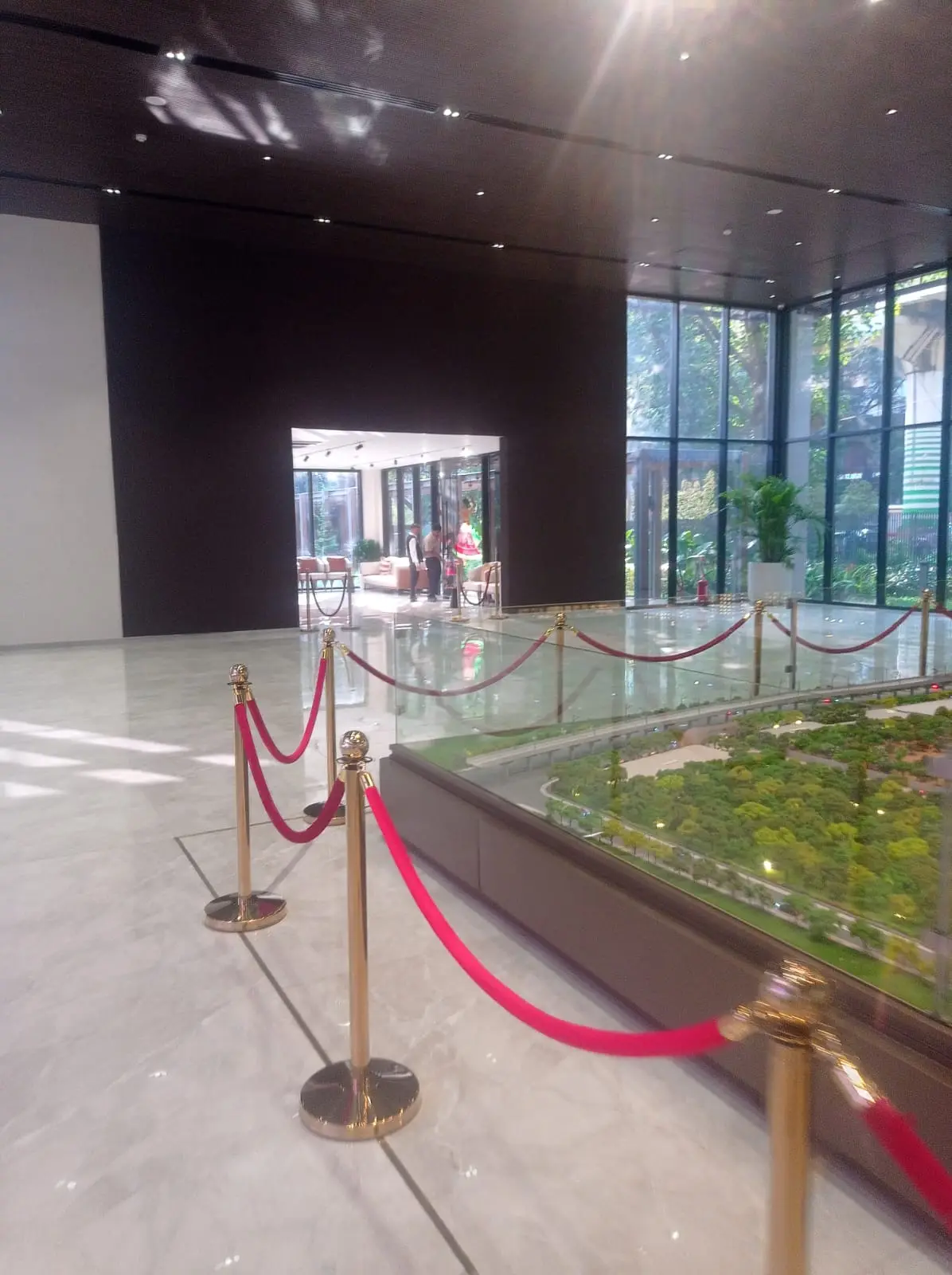Sales Offices — Site model display area with stanchion barriers